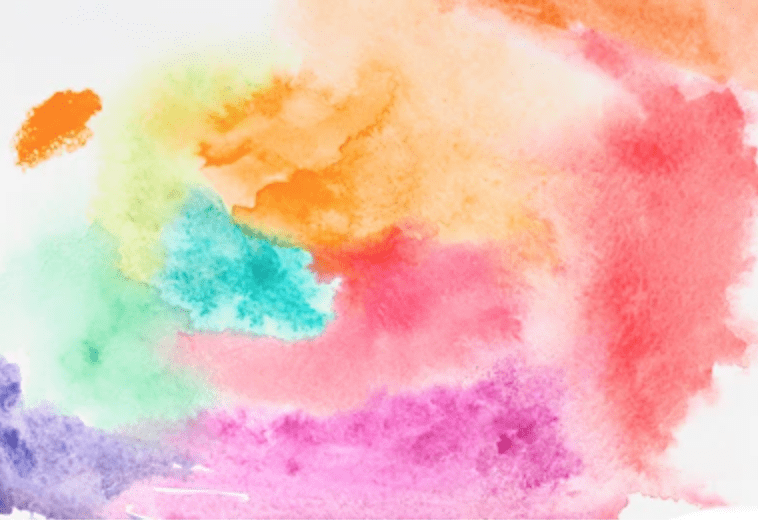 Colourful watercolour paint mixing together